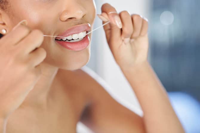 Should You Floss Before or After Brushing?